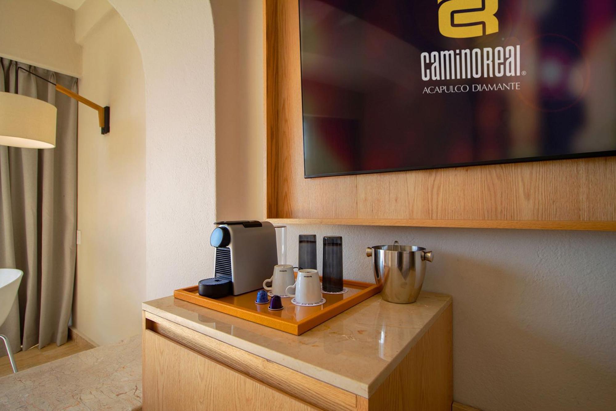 Отель Camino Real Acapulco Diamante Экстерьер фото A Nespresso machine in a hotel room